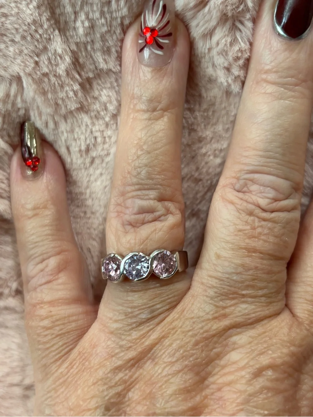 Three-Stone Pink and lavender Cubic Zirconia Ring in Silver
